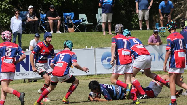 Action galleries of the junior rugby union grand finals, match played at Surfers Paradise Home Ground. Helensvale Hogs Vs Bond Uni Pirates under 14s division. Helensvale Player Kobi Nouanrfasy. Picture Mike Batterham