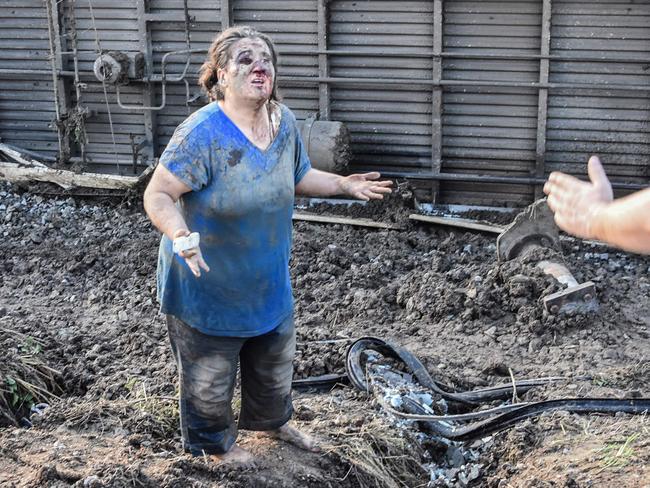 A woman reacts after a train accident in western Turkey in which ten people were killed and 73 injured. Picture: AFP Photo/DHA