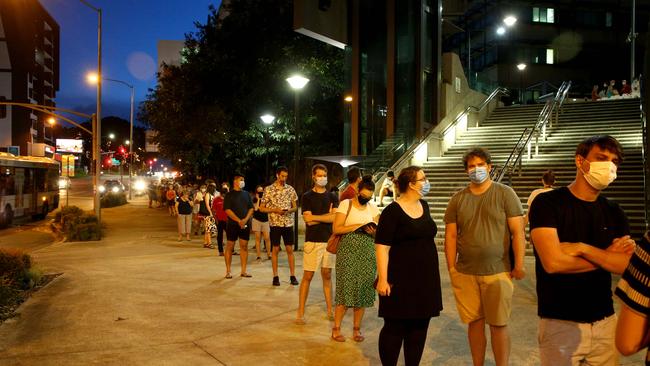 The lines stretched for hundreds of metres on Saturday night. Picture: David Clark