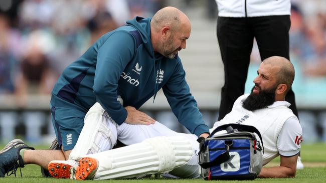 Moeen Ali receives treatment for a groin complaint. (Photo by Ryan Pierse/Getty Images)