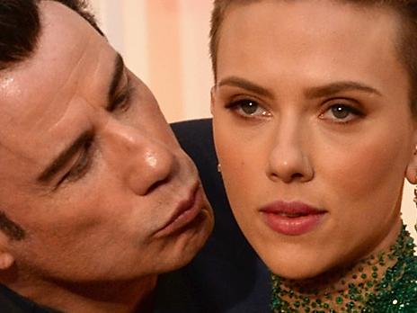 HOLLYWOOD, CA - FEBRUARY 22: Actor John Travolta (L) and actress Scarlett Johansson attend the 87th Annual Academy Awards at Hollywood & Highland Center on February 22, 2015 in Hollywood, California. (Photo by Kevin Mazur/WireImage)