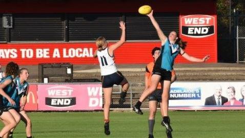 Port Adelaide under-16 girls ruck Georgia Hooper competing against the Crows at Alberton Oval this month. Picture: Supplied