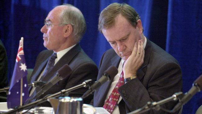 Then-Prime Minister John Howard (left) and Treasurer Peter Costello attend the Liberal Party’s 49th Federal Council Meeting at the Hyatt Hotel in Canberra on April 13, 2002. Picture: File