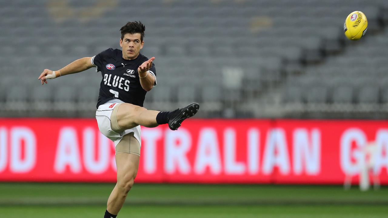 PERTH, AUSTRALIA - AUGUST 15: Matthew Kennedy of the Blues practices kicking before the 2020 AFL Round 12 match between the Fremantle Dockers and the Carlton Blues at Optus Stadium on August 15, 2020 in Perth, Australia. (Photo by Will Russell/AFL Photos via Getty Images)