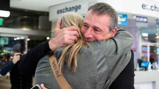 The first batch of Australians arrived back home on Tuesday night, with heartwarming scenes emerging from Sydney’s International Airport. Picture: NCA NewsWIRE/Monique Harmer