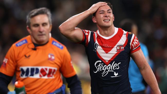 SYDNEY, AUSTRALIA - SEPTEMBER 02:  Joseph Manu of the Roosters reacts after a calf injury during the round 25 NRL match between the Sydney Roosters and the South Sydney Rabbitohs at Allianz Stadium on September 02, 2022, in Sydney, Australia. (Photo by Mark Kolbe/Getty Images)