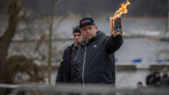 Right-wing politician Rasmus Paludan burning the Koran in Stockholm after a speech in which he attacked Islam. Picture: Getty Images/The Times