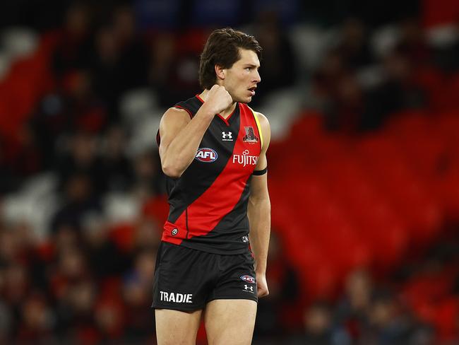 MELBOURNE, AUSTRALIA – AUGUST 14: Archie Perkins of the Bombers celebrates kicking a goal during the round 22 AFL match between the Essendon Bombers and the Port Adelaide Power at Marvel Stadium on August 14, 2022 in Melbourne, Australia. (Photo by Daniel Pockett/Getty Images)