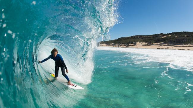 Surfing at Boodjidup Beach, Margaret River.