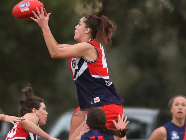 VFL (women's) footy: Diamond Creek v Darebin40 Lauren Pearce takes a strong mark for Darebin.Picture: Stuart Milligan