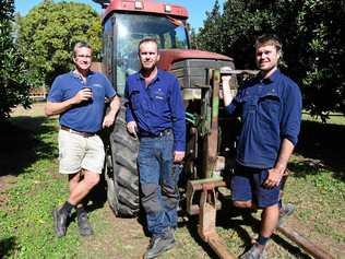 PRIDE IN THEIR PRODUCT: Scott Allcott, John Vaughan and Josh Steinhardt at the macadamia workshop in Alloway. Picture: Mike Knott BUN270619MAC2