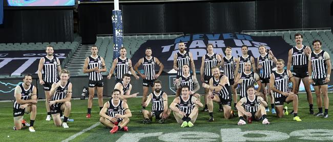 Port Adelaide’s social-distancing, team winning photo after the Showdown. Picture: Sarah Reed