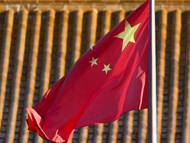 The Chinese flag is seen at the Chinese Embassy in Canberra, Tuesday, May 12, 2020. (AAP Image/Lukas Coch) NO ARCHIVING