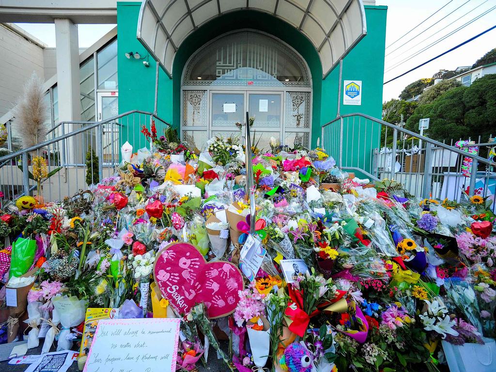 Flowers left by residents at a mosque in Wellington. NZ PM Jacinda Ardern vowed never to utter the name of the attacker. Picture: Dave Lintott / AFP.