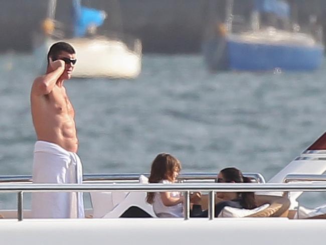 James Packer and his then-wife Erica Packer aboard their yacht in Sydney Harbour with their three children in 2012. Picture: INF.