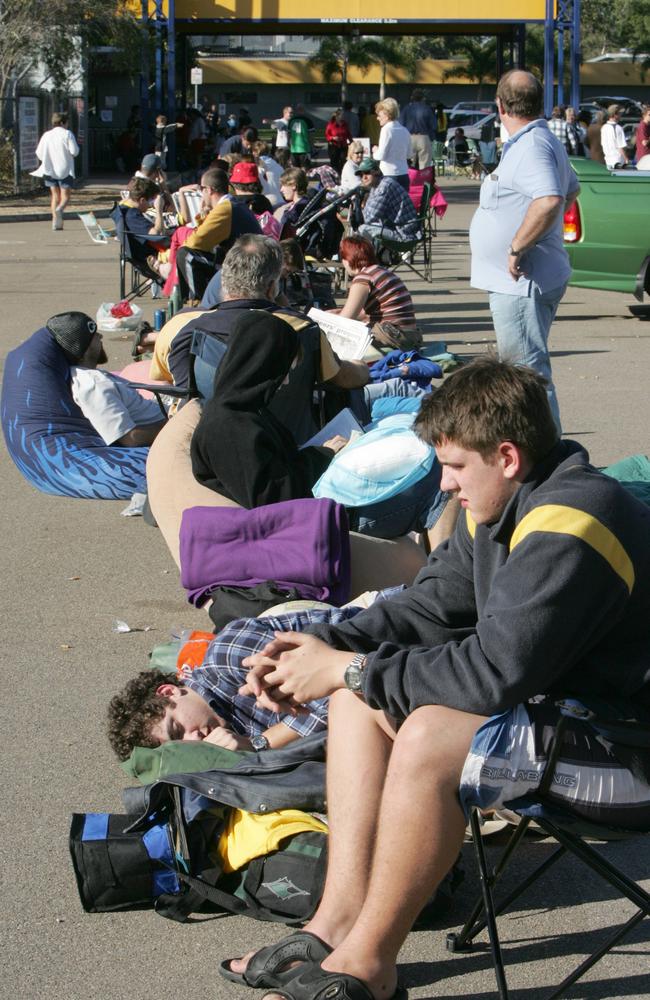 Fans wait in line to buy tickets Cowboys - training at Dairy Farmers stadium