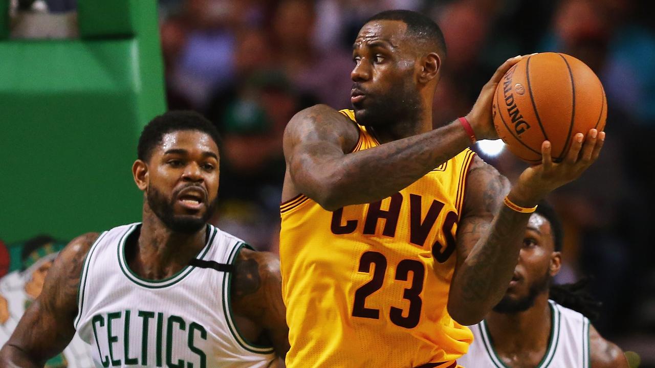 BOSTON, MA - DECEMBER 15: Amir Johnson #90 of the Boston Celtics defends LeBron James #23 of the Cleveland Cavaliers during the third quarter at TD Garden on December 15, 2015 in Boston, Massachusetts. NOTE TO USER: User expressly acknowledges and agrees that, by downloading and/or using this photograph, user is consenting to the terms and conditions of the Getty Images License Agreement. Maddie Meyer/Getty Images/AFP == FOR NEWSPAPERS, INTERNET, TELCOS & TELEVISION USE ONLY ==