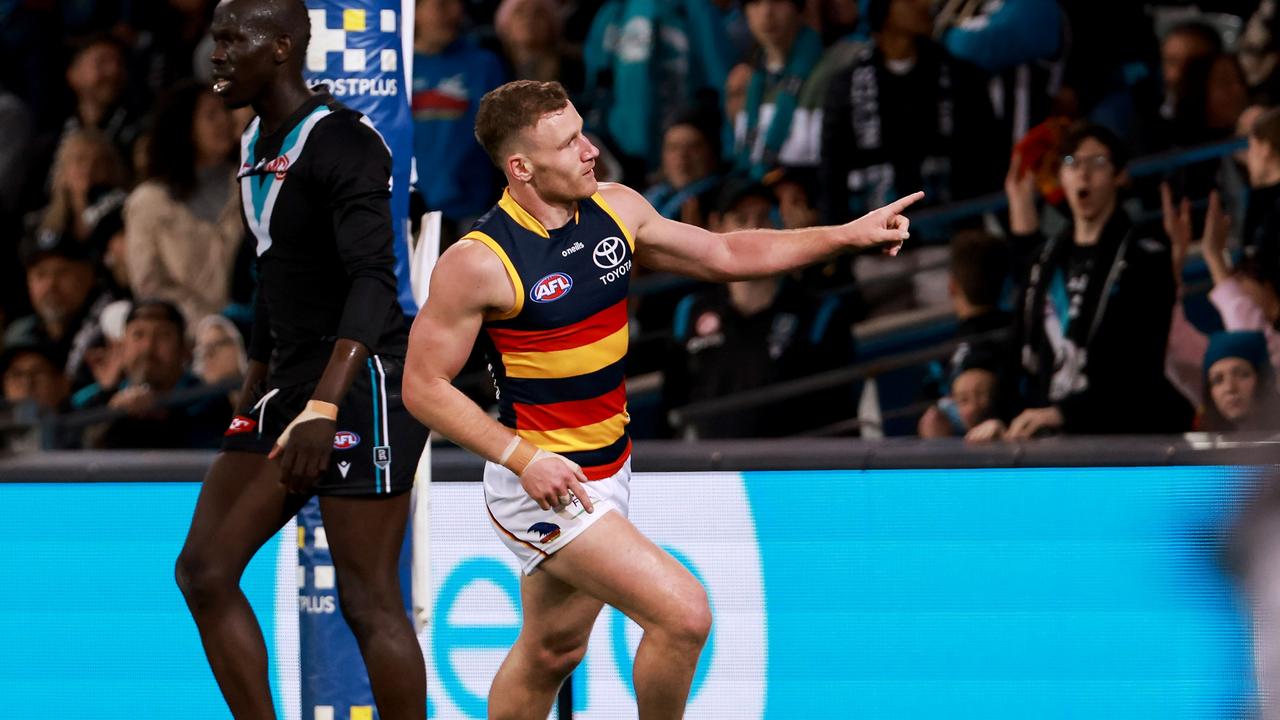 ADELAIDE, AUSTRALIA - AUGUST 20: Rory Laird of the Crows celebrates a goal during the 2022 AFL Round 23 match between the Port Adelaide Power and the Adelaide Crows at Adelaide Oval on August 20, 2022 in Adelaide, Australia. (Photo by James Elsby/AFL Photos via Getty Images)