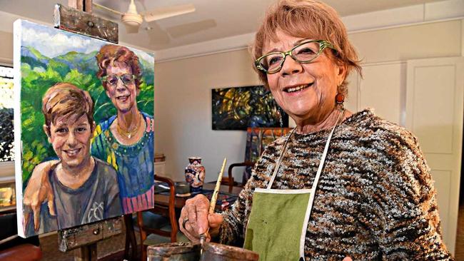 READY TO PAINT: Buderim artist Jose McInnnes with artwork of herself and her grandson. Picture: Warren Lynam