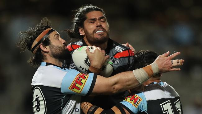 Cronulla's Aaron Woods tackles Warriors Tohu Harris during the Cronulla Sharks v Warriors NRL match at Jubilee Oval, Kogarah. Picture: Brett Costello