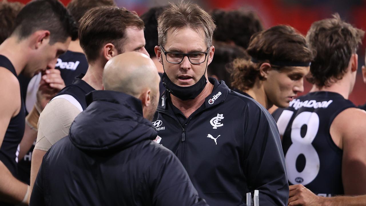 SYDNEY, AUSTRALIA - JUNE 19: Blues head coach David Teague walks away from talking to his players during the round 14 AFL match between the Greater Western Sydney Giants and the Carlton Blues at GIANTS Stadium on June 19, 2021 in Sydney, Australia. (Photo by Mark Kolbe/Getty Images)