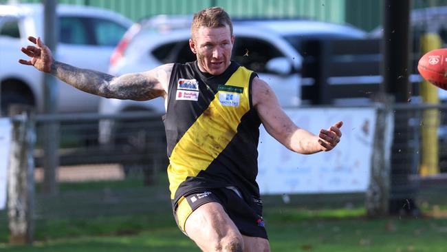 Zach Webb gets a kick for Lancefield. Picture: Hamish Blair