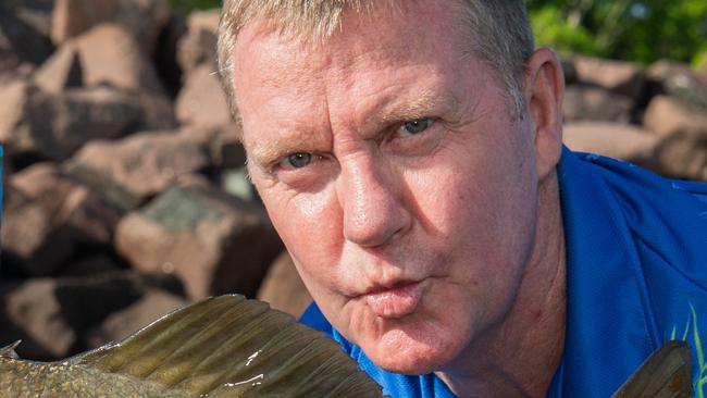 Major Events Minister Paul Kirby holding the tagged million dollar barramundi as he officially open season nine of the Million Dollar Fish competition. Picture: Pema Tamang Pakhrin