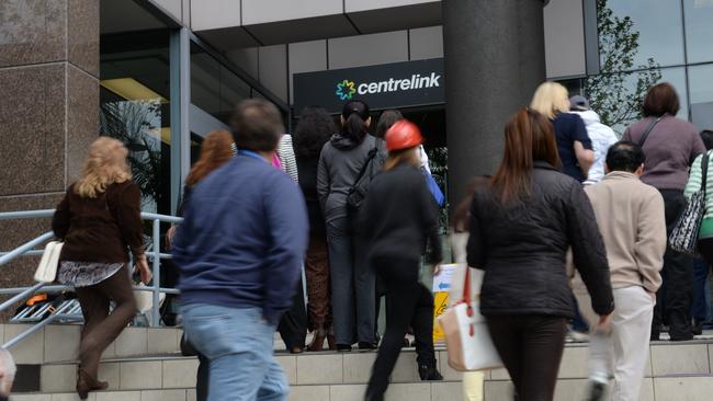 Generic photographs of people entering the Centrelink building in Bankstown NSW Australia (following a fire drill).