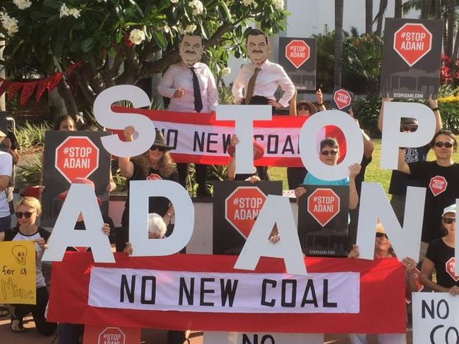 Stop Adani action group protests outside The Ville during a business breakfast where Adani Mining CEO Lucas Dow was guest speaker. Photo: Stop Adani