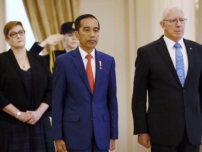 Joko Widodo, left, and Governor-General David Hurley. Picture: AP