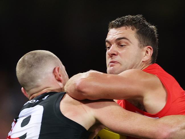 SYDNEY, AUSTRALIA - MARCH 23: Tom Papley of the Swans and Nick Hind of the Bombers compete for the ball during the round two AFL match between Sydney Swans and Essendon Bombers at SCG, on March 23, 2024, in Sydney, Australia. (Photo by Mark Metcalfe/AFL Photos/via Getty Images )