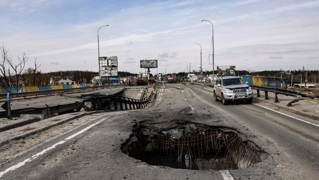 A damaged bridge on the outskirts of Kyiv at the weekend. Picture: AFP