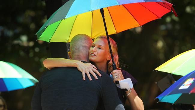 Sarah Murdoch embracing Ian Roberts after his emotional speech at the launch of Qtopia Sydney. Picture: Richard Dobson