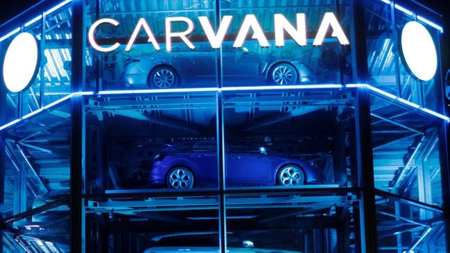 A Carvana dealership in Austin, Texas includes an automated tower for cars on order by its customers. Picture: Reuters