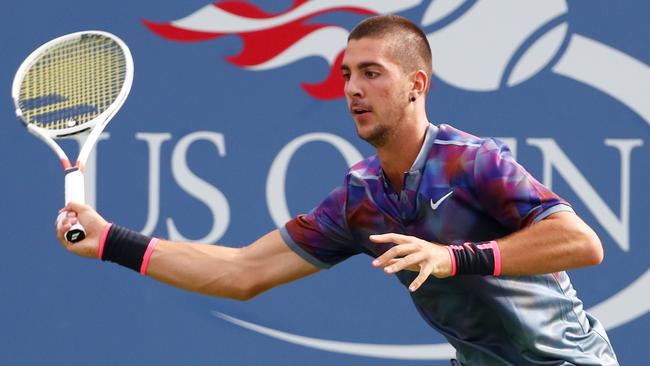 Thanasi Kokkinakis returns a shot during his first round of the US Open.