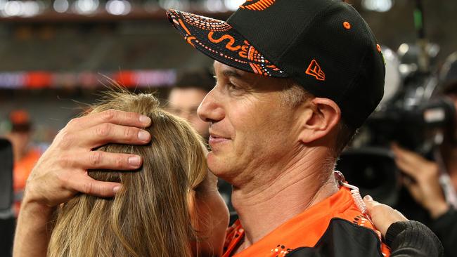 An Michael Klinger hugs his wife Cindy after the match. Picture: Getty