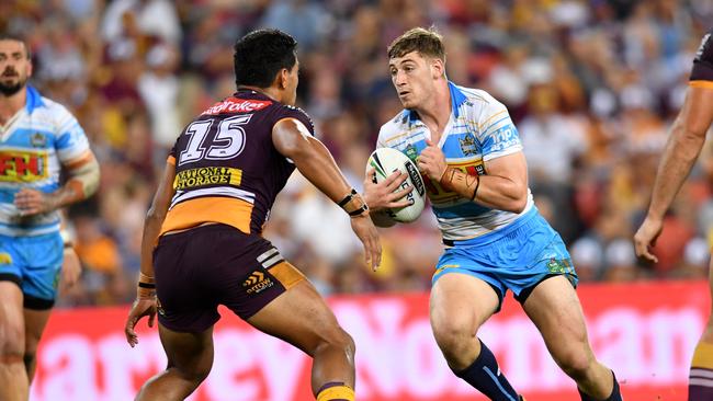 Max King runs at Brisbane prop Joe Ofahengaue. Picture: AAP Image