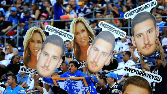 A San Diego Chargers fan cheers during the second half of a game.