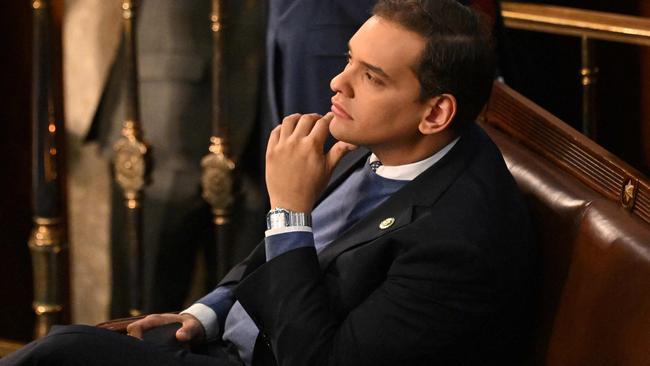 George Santos sits alone at the back on the Republican side of the chamber on Tuesday. Picture: AFP