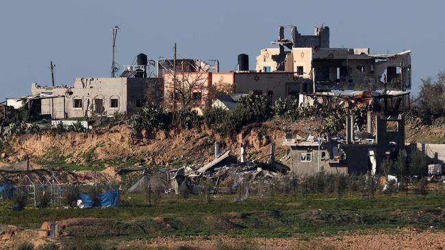 A picture taken on January 25, 2024 from southern Israel on the border with the Gaza Strip shows buildings in the Palestinian territory destroyed during Israeli bombardment, amid the ongoing battles between Israel and the militant group Hamas. Picture: Jack Guez/AFP