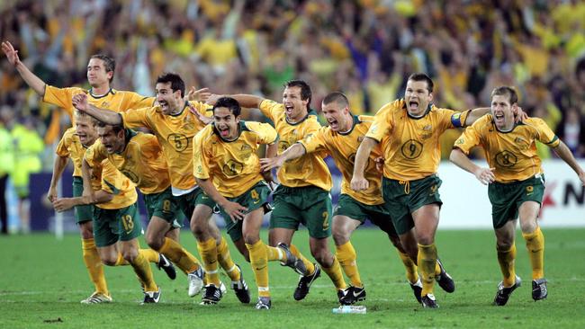 The Socceroos react after John Aloisi’s penalty, while Harry Kewell soaks it all up.