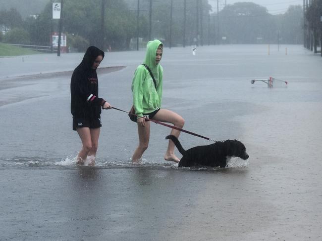 Mcilwraith street in Ingham after torrential rain struck the Hinchinbrook Shire this morning. Photograph: Cameron Bates