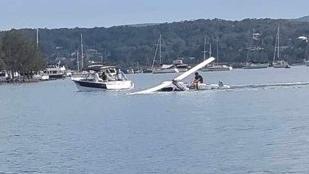 Two people have survived after a gyrcopter crashed into Lake Macquarie near Marmong Point on April 3, 2024. Picture: Carmen Wilson.