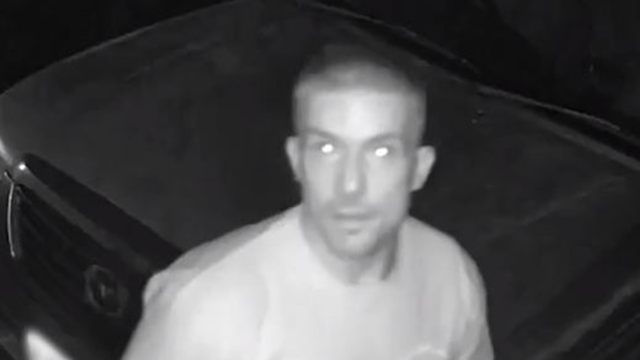 Police are seeking information about a man captured on video outside a house at Mount Warren Park. Picture: QPS