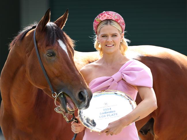 Shayna Jack cuddles up with Cox Plate fancy, Docklands. Picture: David Caird