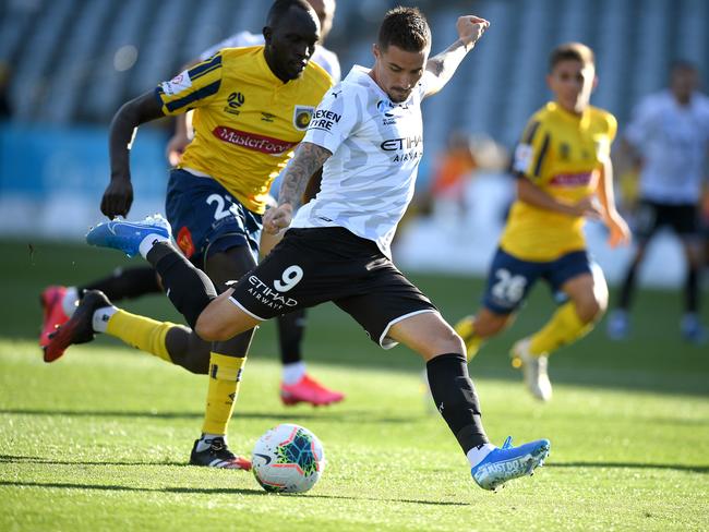 Jamie Maclaren of City takes a shot at goal during the Round 24 A-League match between Central Coast Mariners and Melbourne City at Central Coast Stadium in Gosford, Friday, March 20, 2020. (AAP Image/Dan Himbrechts) NO ARCHIVING, EDITORIAL USE ONLY