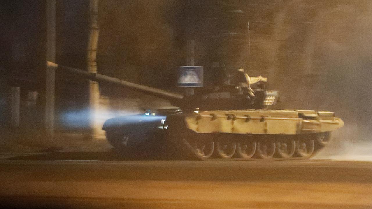 A tank drives along a street after Russian President Vladimir Putin ordered the deployment of Russian troops to two breakaway regions in eastern Ukraine. Picture: REUTERS/Alexander Ermochenko