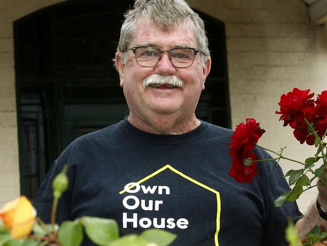 Stephen McAuley with the roses in his garden at his  Paddington Home.  How are people in Paddington coping with the Covid -19 Lockdown. Picture: John Appleyard