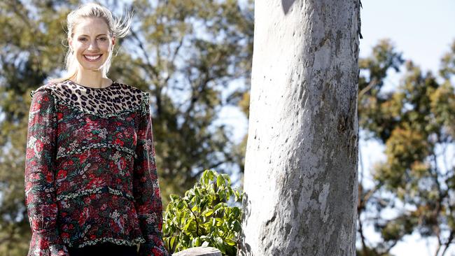 Queensland Firebirds player Laura Geitz poses for photographs during a press conference announcing her retirement. Picture: AAP