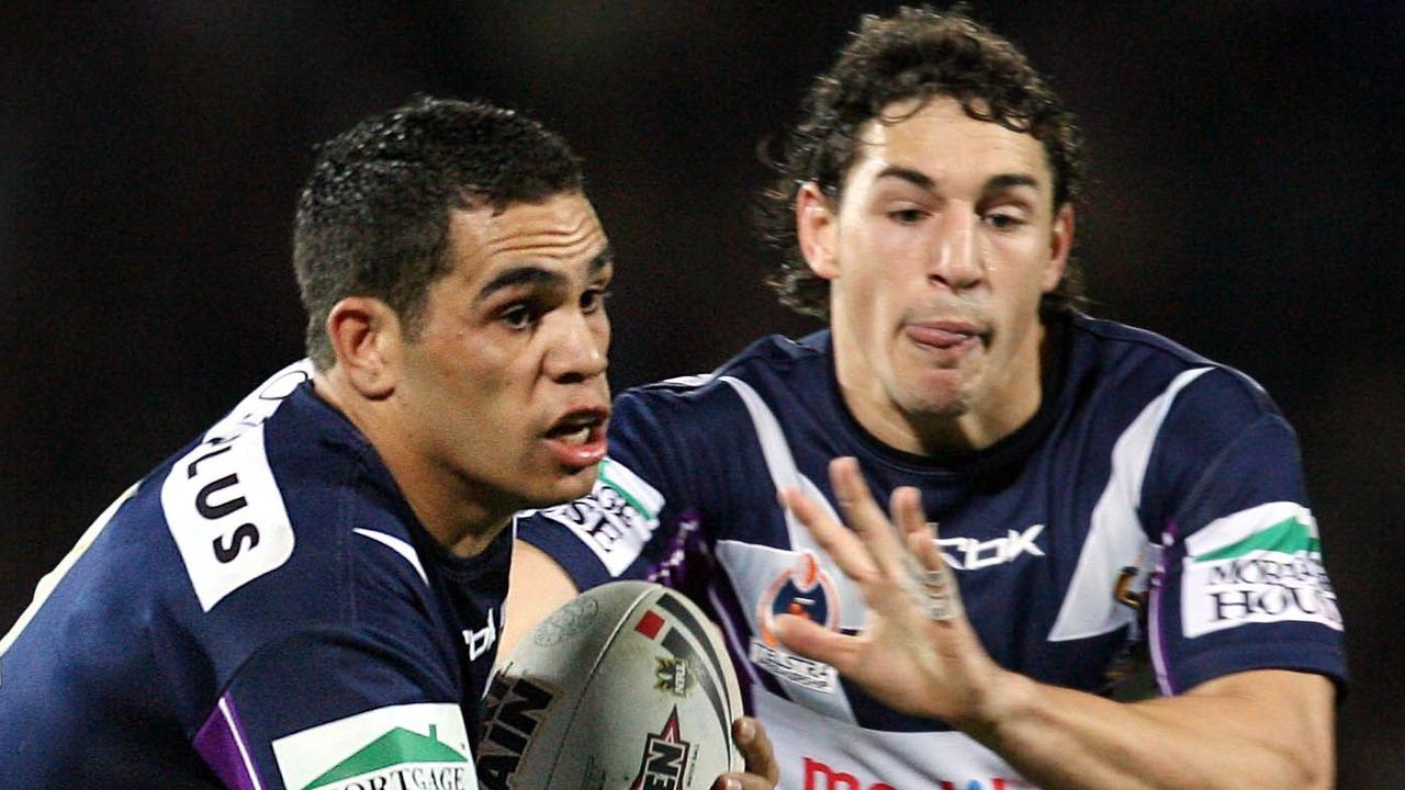 Greg Inglis and Billy Slater in action for Melbourne Storm.